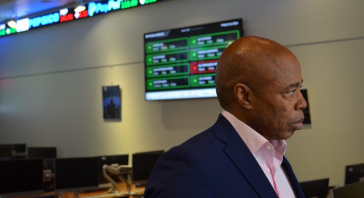 Brooklyn Borough President Eric Adams tours the new financial simulation lab at Medgar Evers College. Photo by Kevin Limiti